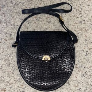 Leather bag with gold lock